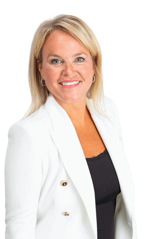 Alison Hodges, PMHNP, smiling in a white blazer and black top.