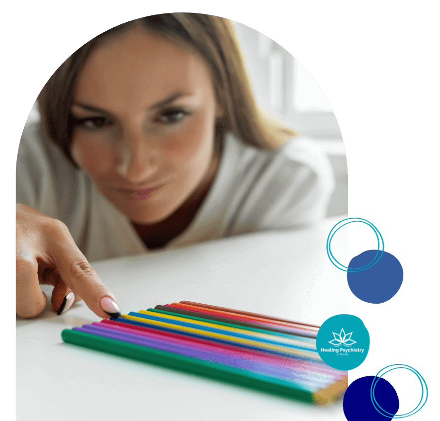 ocd therapy near altamonte springs, florida A woman aligning colored pencils; logo for Healing Psychiatry. OCD therapy near Altamonte Springs, Florida.