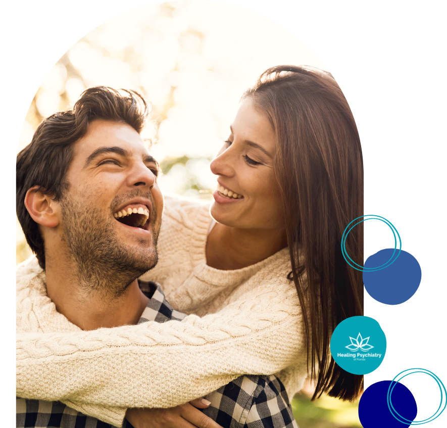 Happy couple embracing in laughter, reflecting the success of individualized depression therapy services in Altamonte Springs.