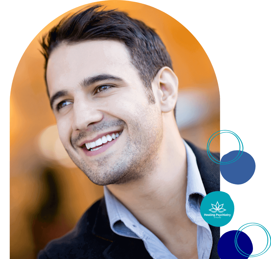 Smiling man looking away, representing successful bipolar disorder treatment in Altamonte Springs