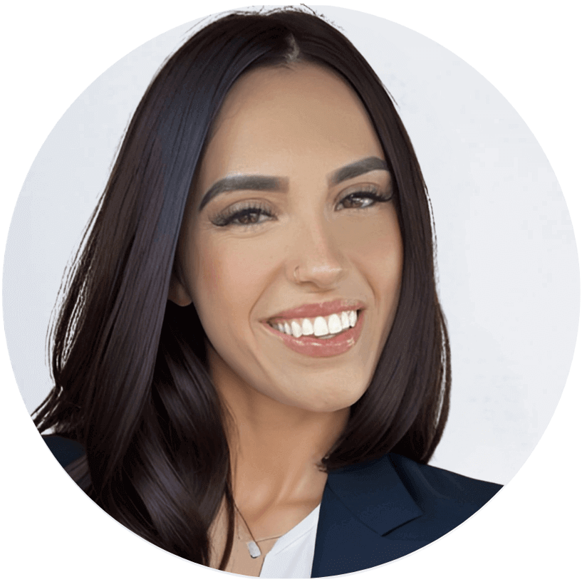 Professional headshot of Yesenia Vazquez, LCSW, smiling and wearing a blazer