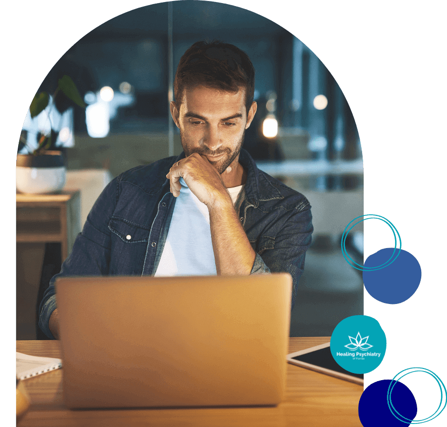 Man fully immersed in his work, utilizing skills honed from ADHD Therapy Sanford to optimize his focus and manage tasks efficiently.