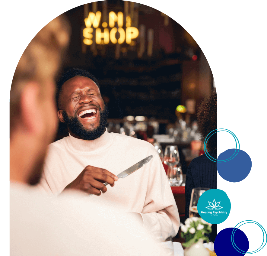 Man sharing a joyful moment with friends, reflecting the positive social interactions encouraged by Depression Treatment Sanford, enhancing life's pleasure and connection.