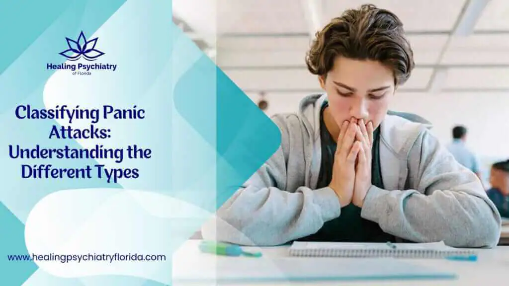 Young person sitting at a desk with hands clasped, appearing anxious, Classifying Panic Attacks