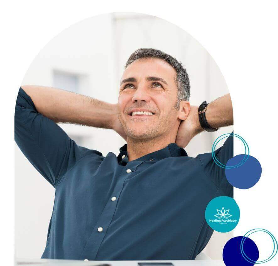 Smiling man looking relaxed and hopeful, symbolizing recovery and well-being, representing positive outcomes of opioid addiction treatment at Healing Psychiatry Florida.