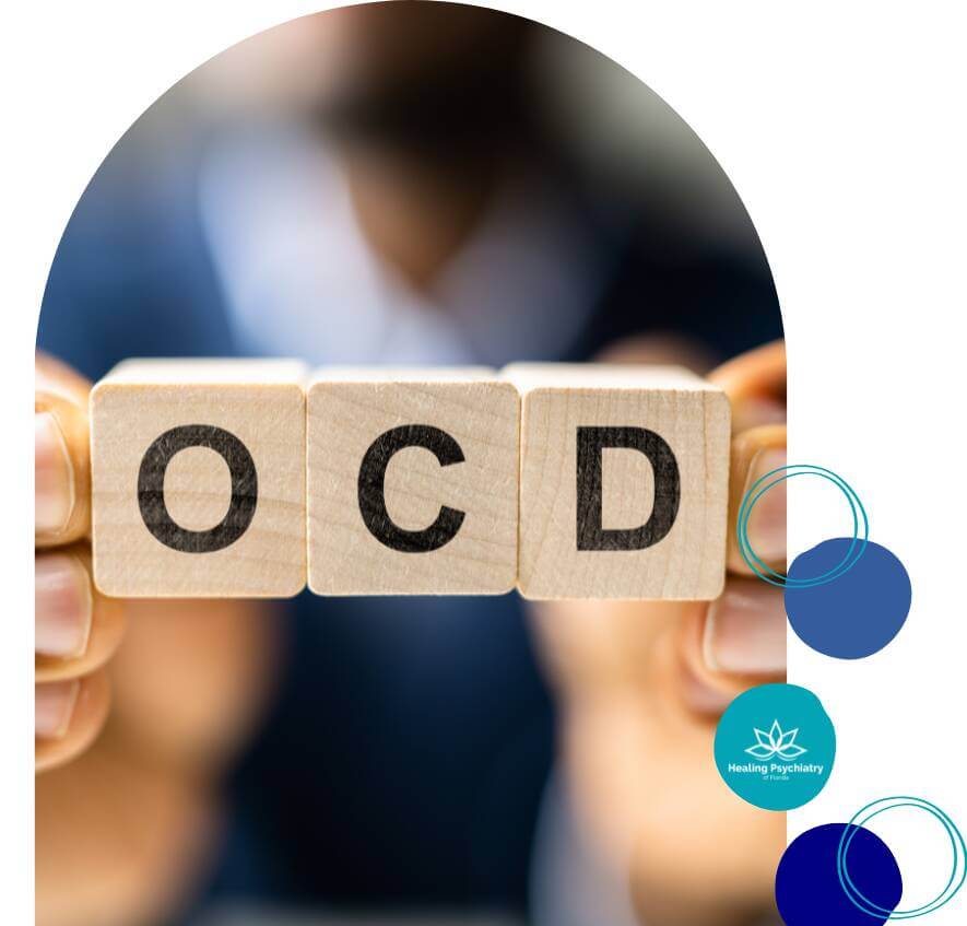 ocd child A close-up image of a person holding wooden blocks with the letters "OCD" on them, symbolizing obsessive-compulsive disorder.